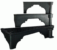 cast iron stair tread showing filigree pattern